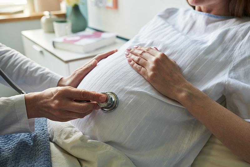 A woman receiving an assessment at a pregnancy clinic