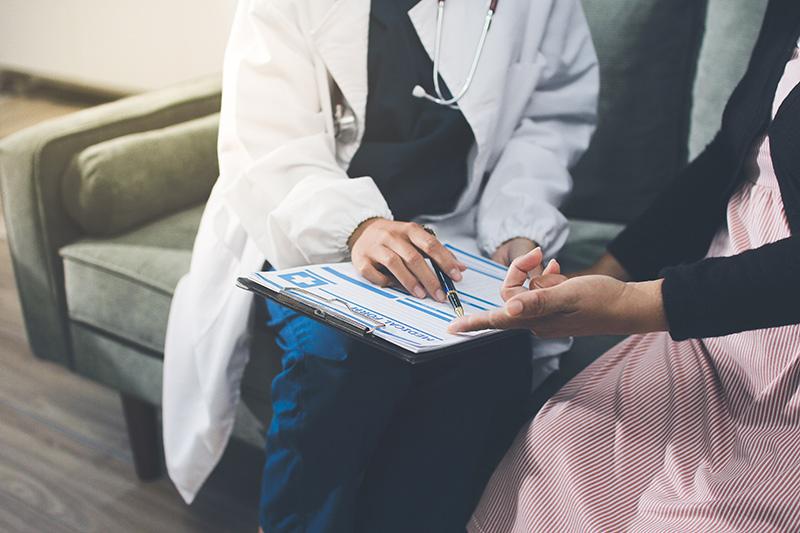 A woman undergoing a gynaecology consultation
